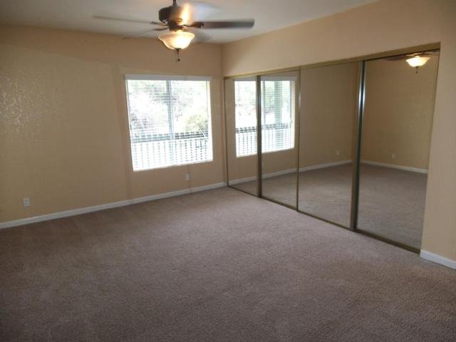 Mirror Closet In Large Bedroom